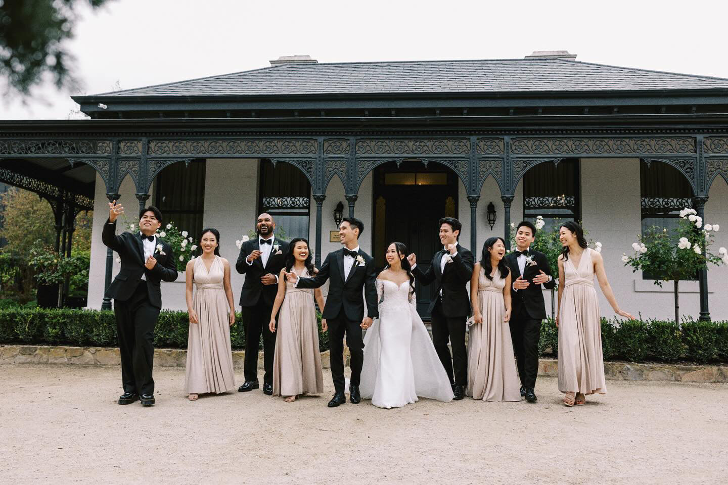 Wedding party in formal attire wearing Champagne Infinity Gown, a convertible dress Australia