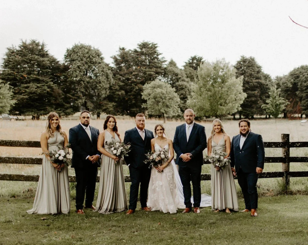 Wedding party in Eucalyptus Infinity Gown and convertible dresses outdoors