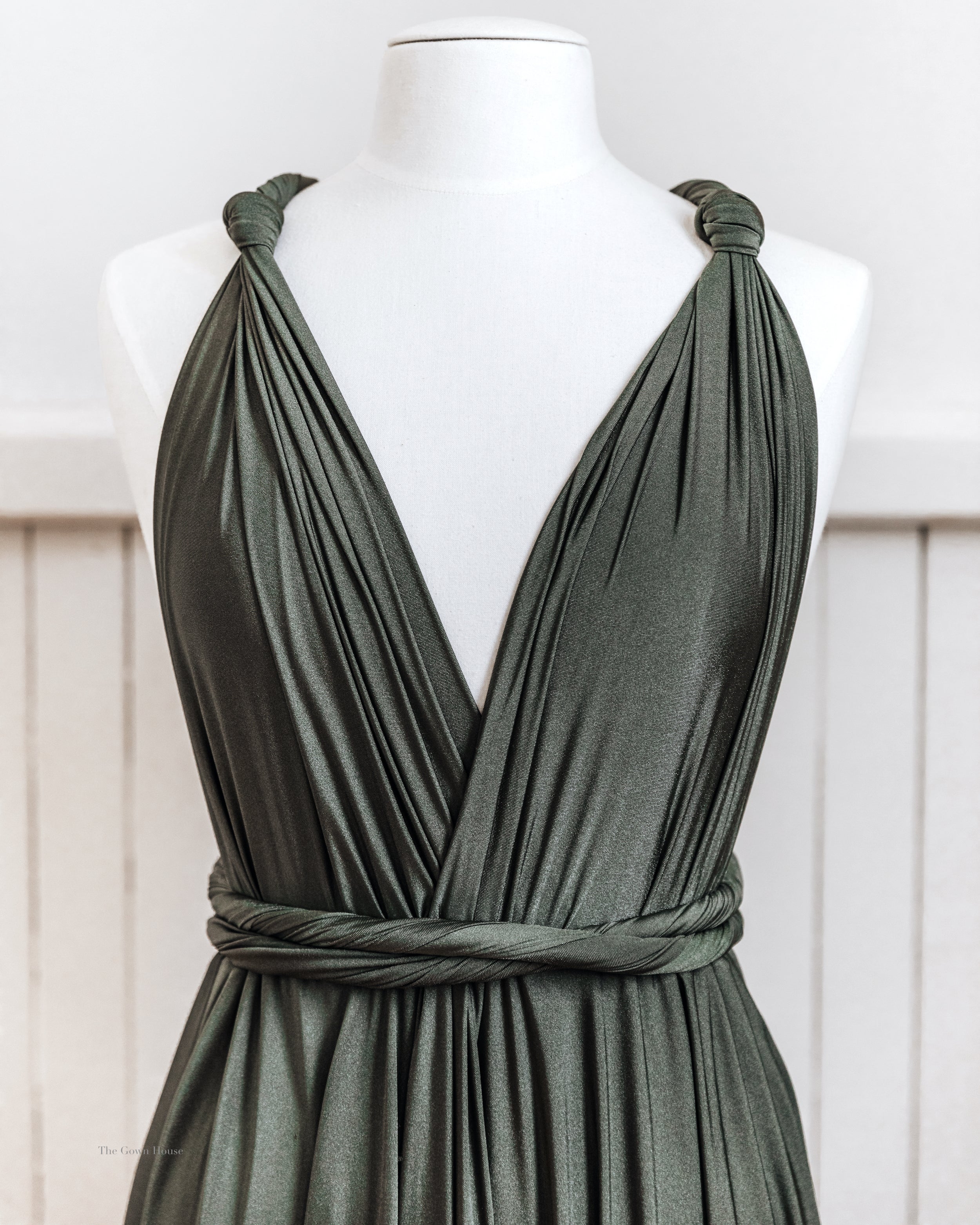 Dark green Olive Infinity Gown convertible dress on mannequin, perfect multiway bridesmaid dress