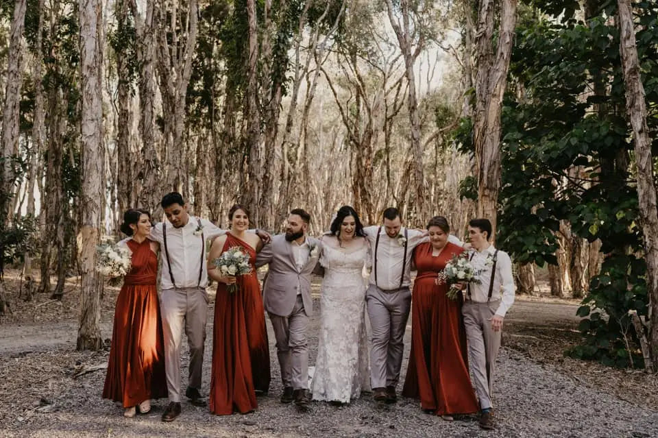 Wedding party in rustic attire with infinity dresses at Tarni and Joseph celebration