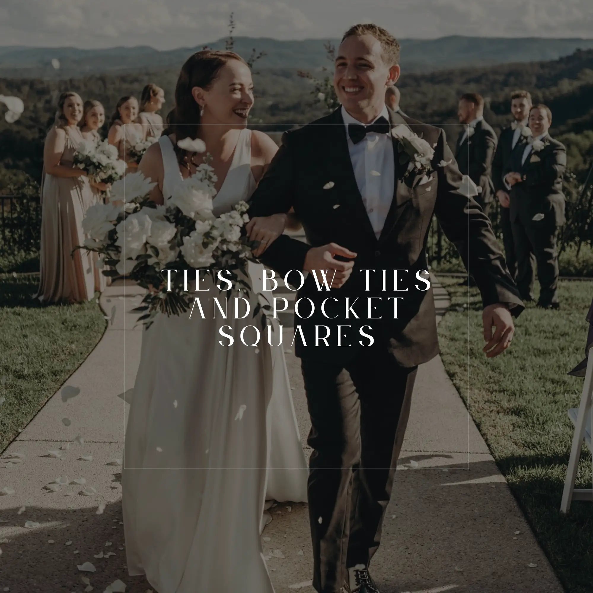 Happy wedding couple walking down outdoor aisle with stylish ties pocket squares and bow ties
