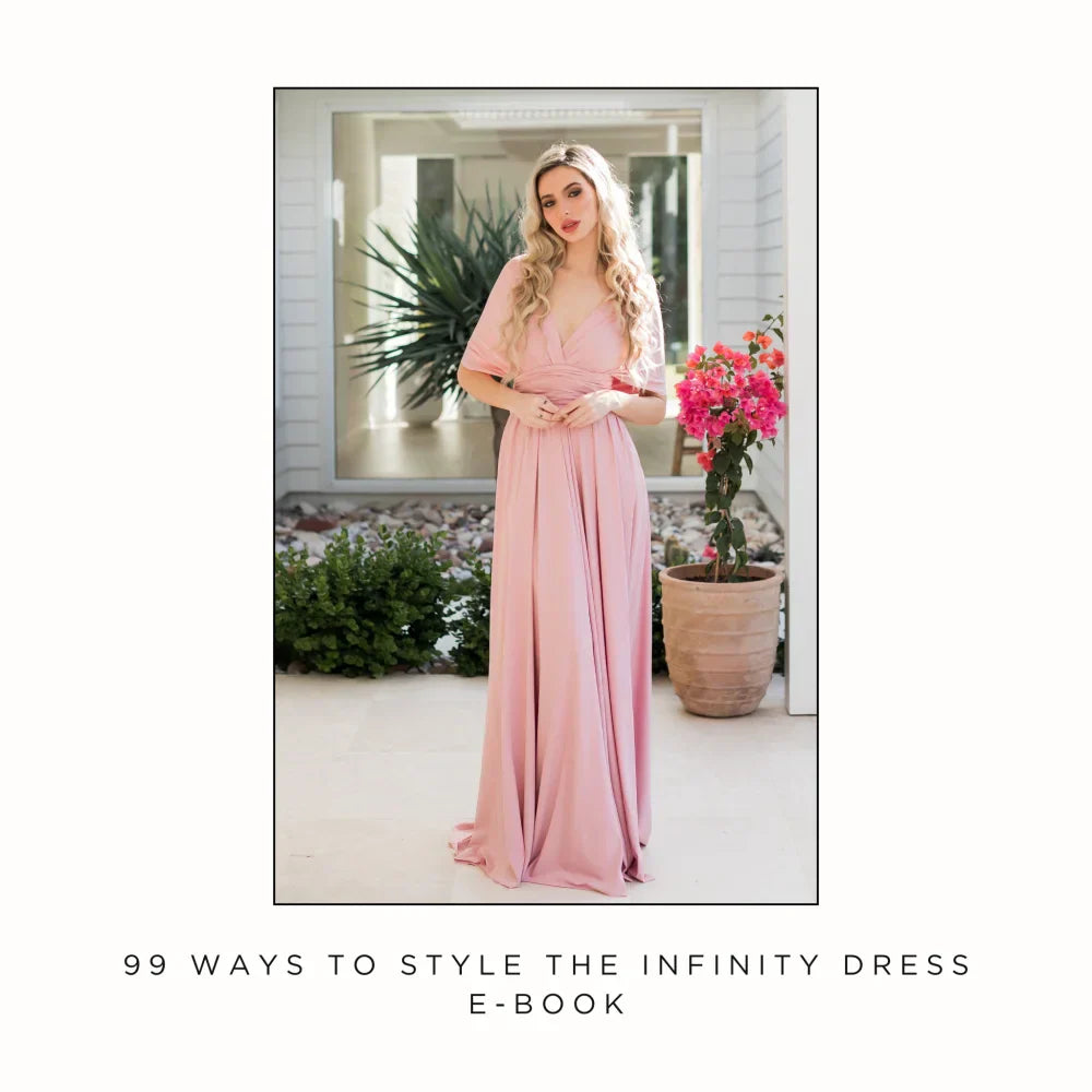 Long light pink infinity bridesmaid dress with v-neck and draped sleeves for multiway styling