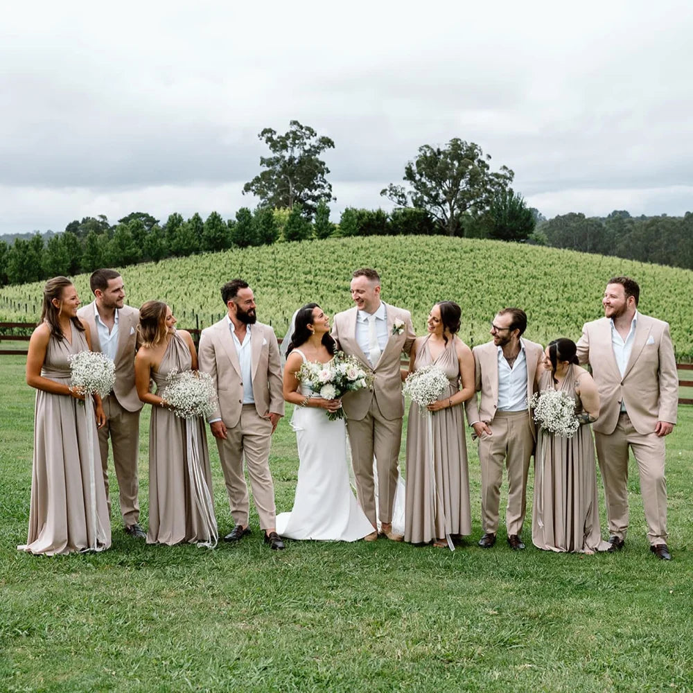 Wedding party outdoors in a vineyard wearing Gold Infinity Gown, perfect multiway bridesmaid dress Australia