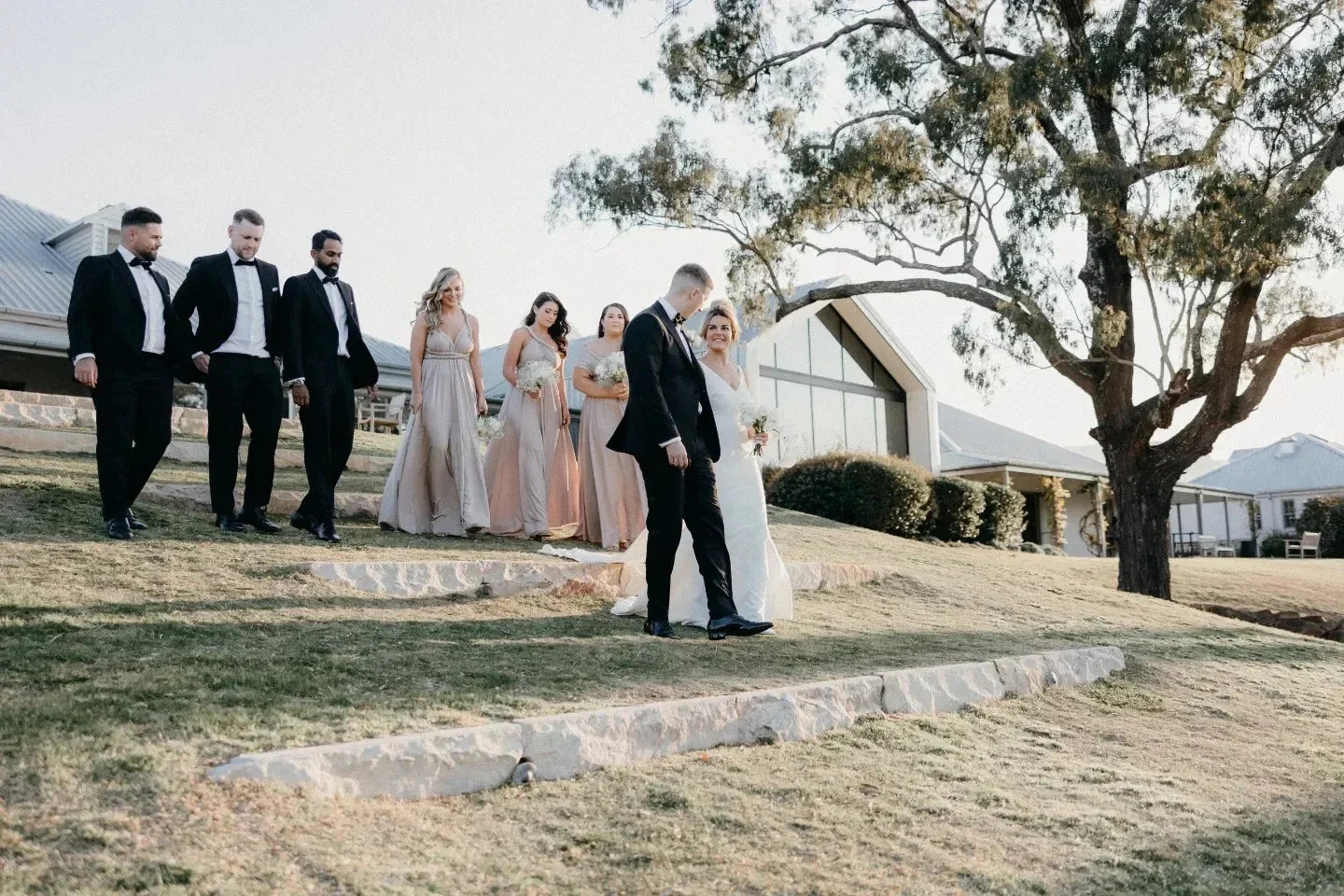 Wedding party outdoors wearing Gold Infinity Gown, perfect multiway bridesmaid dress Australia