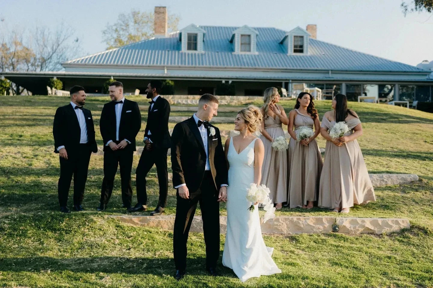 Wedding party in formal attire wearing Gold Infinity Gown, perfect multiway bridesmaid dress Australia