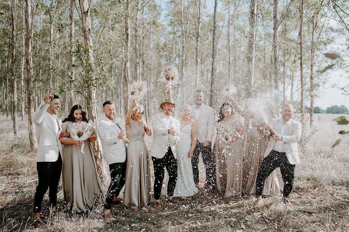 Celebrating in a forest wearing Gold Infinity Gown, perfect multiway bridesmaid dress Australia
